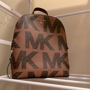 Michael Kors Medium Dallas Slim Backpack in Brown